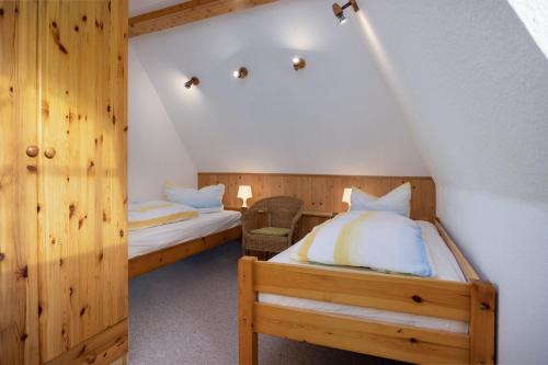 Postel nebo postele na pokoji v ubytování Ferienhof Schwalbennest OFC 24
