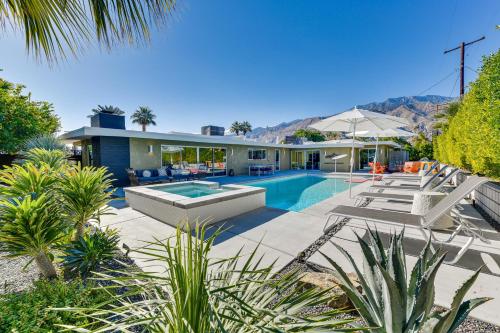 a home with a swimming pool and a house at Luxury Coachella Rental Near Dtwn Palm Springs! in Palm Springs