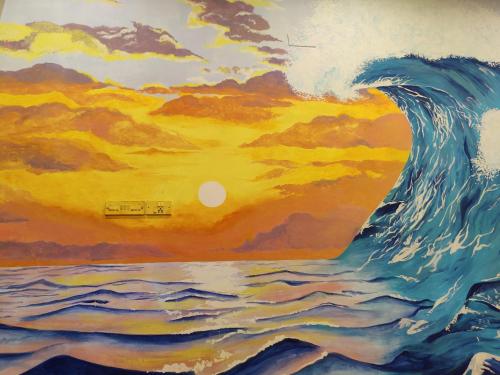 a painting of the ocean with a large wave at Unpack Hostel in Pondicherry