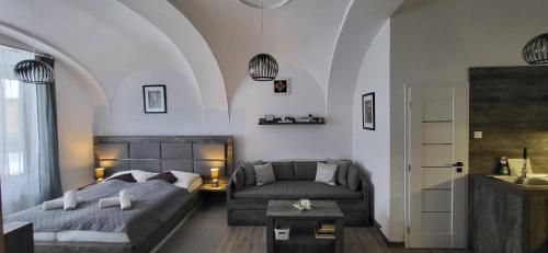 Postel nebo postele na pokoji v ubytování Studio apartmán Kežmarok