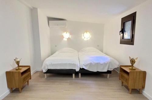 Katil atau katil-katil dalam bilik di Duplex de caractère en Balagne