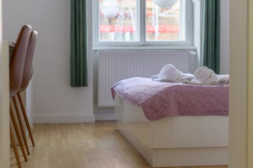 Katil atau katil-katil dalam bilik di Niva Rooms & Studio Apartment
