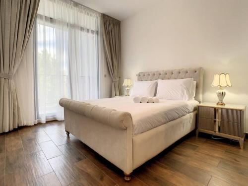 Una cama o camas en una habitación de Key View - Villa, Casa Flores