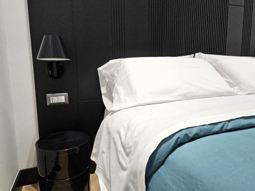 Postel nebo postele na pokoji v ubytování Orefici Place