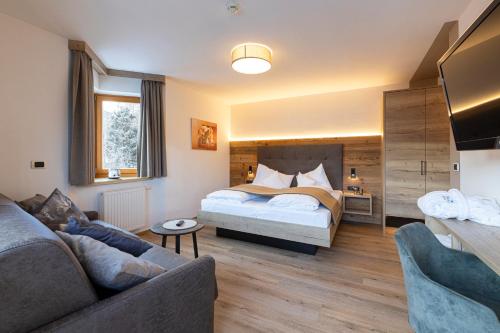 Postel nebo postele na pokoji v ubytování Hotel Thuinerwaldele