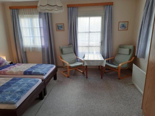 Postel nebo postele na pokoji v ubytování Ferienwohnung Haus Gomig