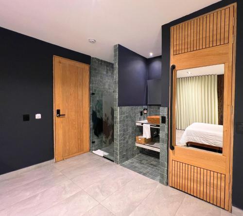Cama o camas de una habitación en Hotel Zelva Negra