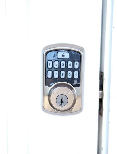 a remote control sticking out of a door at palmview estate townhouse in Mammee Bay