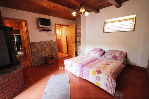 Postel nebo postele na pokoji v ubytování Cserhát Guesthouse