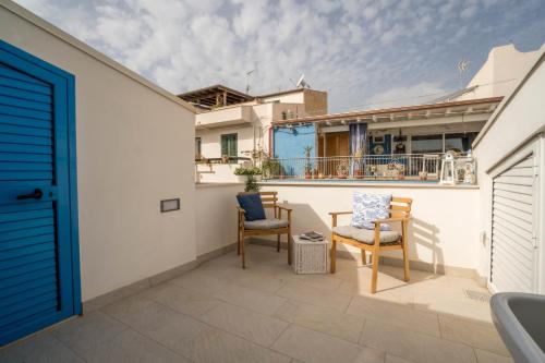 En balkon eller terrasse på CapoSud - Appartamento Sottovento