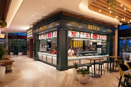 a restaurant with a pizza display in a building at Durango Casino & Resort in Las Vegas