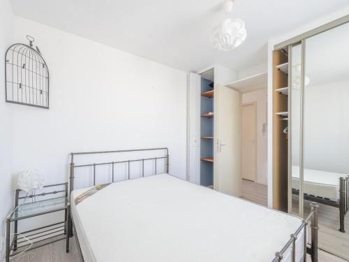 Postel nebo postele na pokoji v ubytování Appartement Châtelaillon-Plage, 2 pièces, 4 personnes - FR-1-535-37