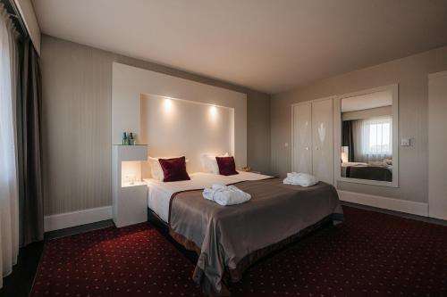 Posteľ alebo postele v izbe v ubytovaní Platinum Palace Boutique Hotel & SPA