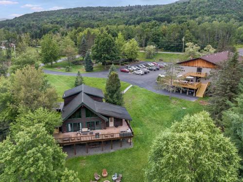 an aerial view of a large house with a parking lot at Hotel Vienna in Windham