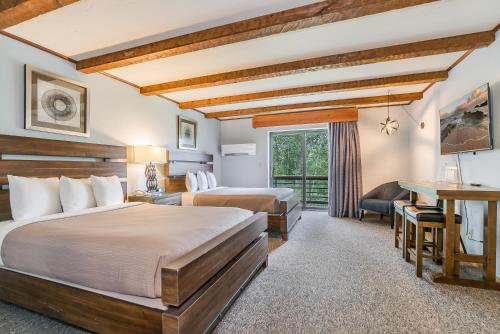 Postel nebo postele na pokoji v ubytování Hotel Vienna