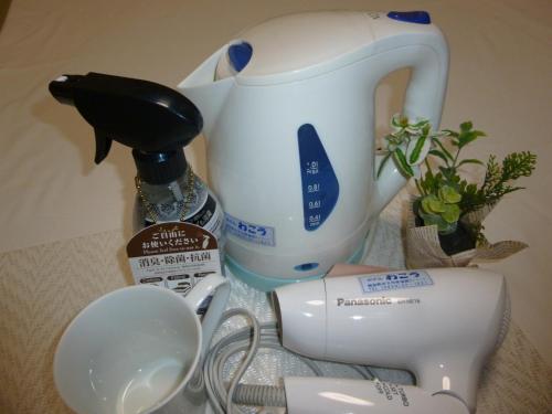 a counter top with a mixer and a coffee maker at Hotel Wakow - Vacation STAY 22127v in Yonago