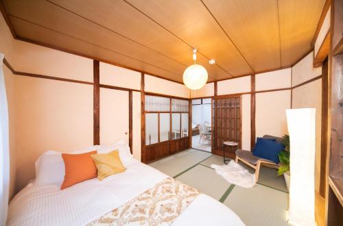 Tempat tidur dalam kamar di Anju - Vacation STAY 15840