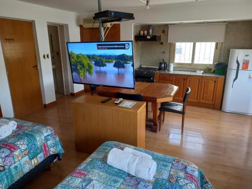 Η κουζίνα ή μικρή κουζίνα στο Vía Lavalle Suites 1