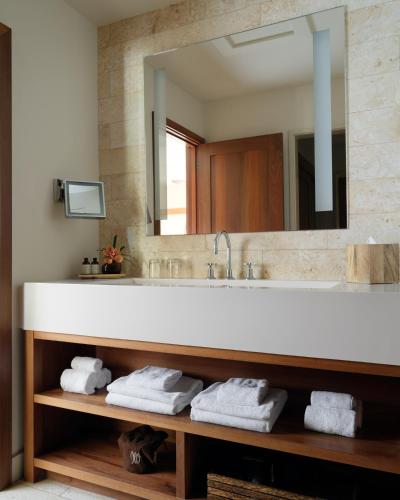 a bathroom with a sink and a mirror at Hotel Wailea, Relais & Châteaux - Adults Only in Wailea