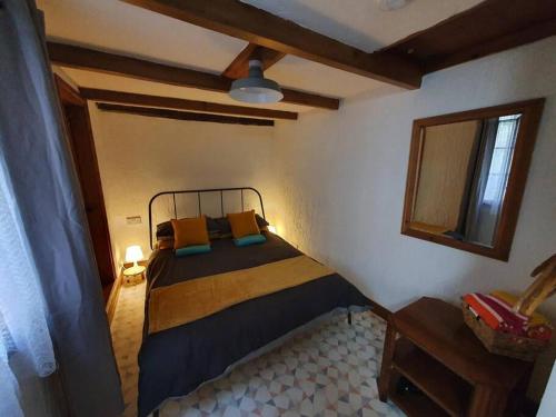 En eller flere senge i et værelse på Beckside Cottage