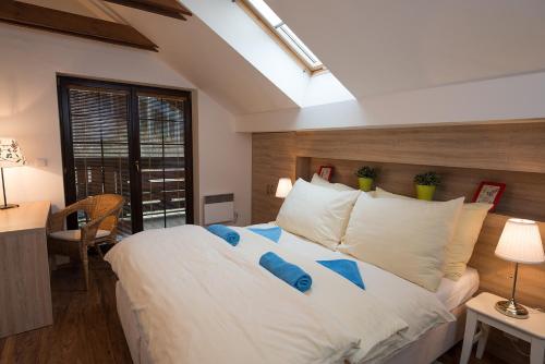 Ένα ή περισσότερα κρεβάτια σε δωμάτιο στο Apartmany Hrabovo