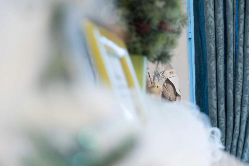 a close up of a fence with figurines on it at Blue light ultracentral in Craiova
