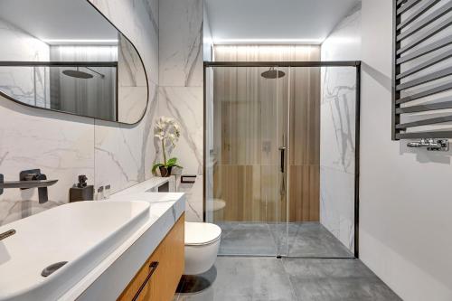 Kúpeľňa v ubytovaní Apartamenty Portova Q4Apartments