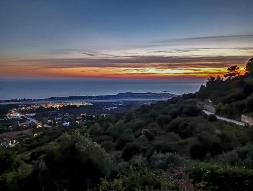 a view of the city at sunset at Irida's house in Kefallonia