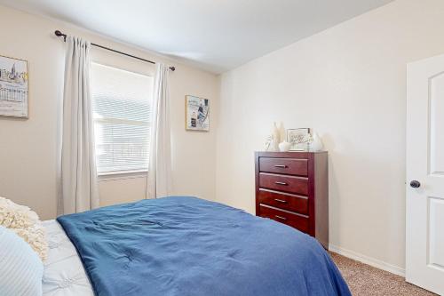 Una cama o camas en una habitación de Oro Oasis