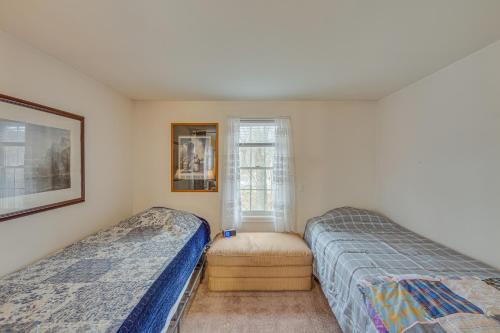 a bedroom with two beds and a window at Tranquil Mt Pleasant Mills Retreat on 60-Acre Farm in Dalmatia