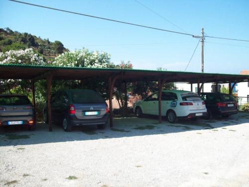 a group of cars parked in a parking lot at B & B Summer in Marciana