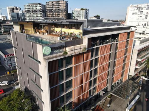 an aerial view of a building in a city at Ovolo The Valley Brisbane in Brisbane