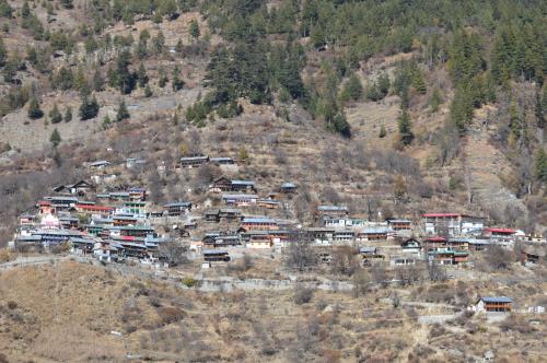 a small village on a hill in the mountains at Laxmi Narayan Homestay-Harshil in Harsil