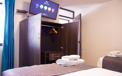Letto o letti in una camera di Hotel La Casa de Irma