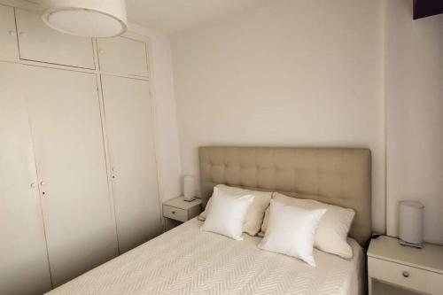 Ένα ή περισσότερα κρεβάτια σε δωμάτιο στο Departamento La Florita -nivel ejecutivo-