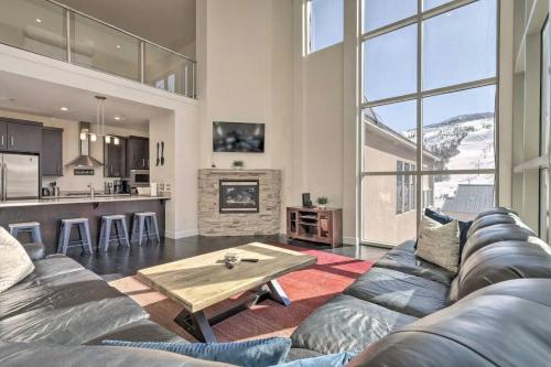 a living room with a couch and a table at The Lofts #8d - Right by Ski Lifts in Brian Head