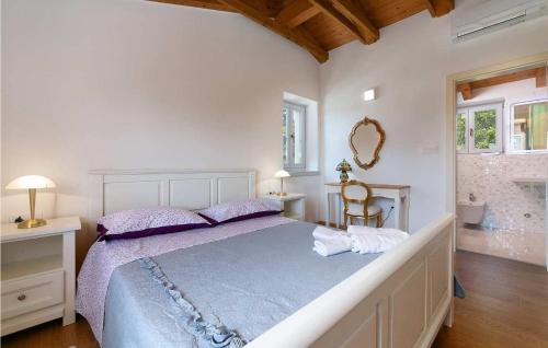 Voodi või voodid majutusasutuse Villa Irena Funtana toas