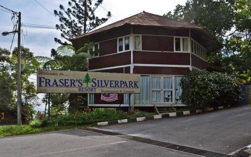 a house with a sign in front of it at Silverpart Resort Fraser Hill B5-6-1 Forest View High Floor No lift in Bukit Fraser