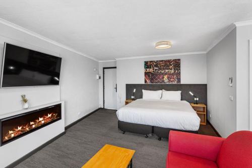 Ένα ή περισσότερα κρεβάτια σε δωμάτιο στο Apollo Bay Motel & Apartments