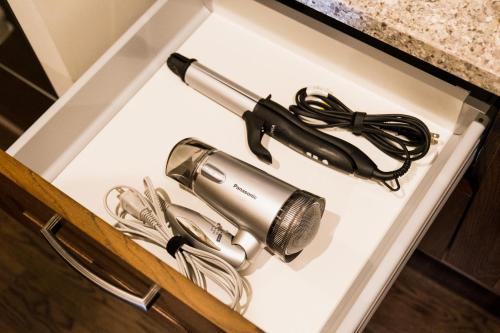 a microphone and other items on a table at Monterey House by SANA in Tateyama