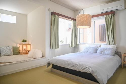 Katil atau katil-katil dalam bilik di YIAN-Chihaya