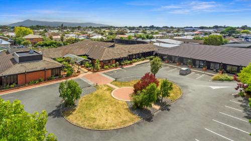 an overhead view of a parking lot in a town at Riverside Hotel Marlborough in Blenheim