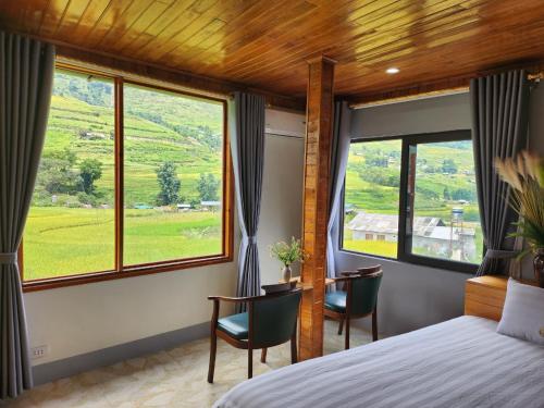 Postel nebo postele na pokoji v ubytování Mường Hoa Local House
