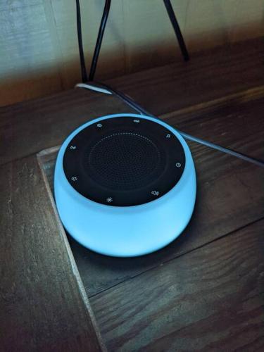 a speaker sitting on top of a wooden floor at Evergreen Escape At Snowshoe in Snowshoe