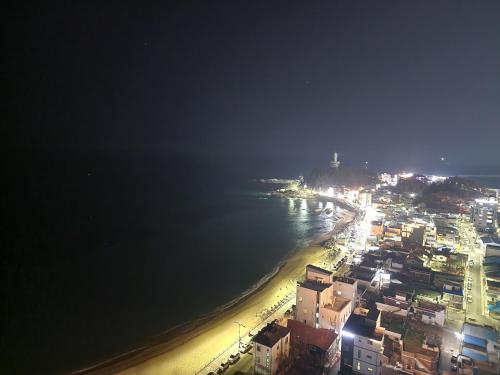 an aerial view of a beach at night at Sokcho Summitbay 1701 "Ocean View" in Sokcho