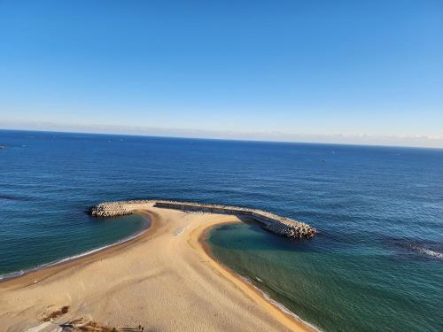 an island in the middle of the ocean at Sokcho Summitbay 1701 "Ocean View" in Sokcho