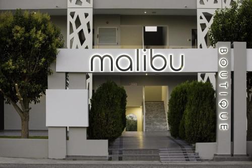 a sign for the headquarters of the ministry of foreign affairs of morocco at Malibu Boutique Studios & Bungalows in Faliraki