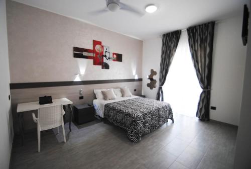Ένα ή περισσότερα κρεβάτια σε δωμάτιο στο Novo Motel