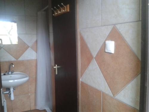Koupelna v ubytování Toldi Vendégház