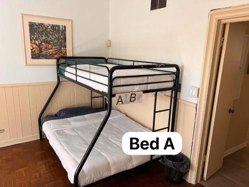 Letto o letti in una camera di Pill Hill Mansion